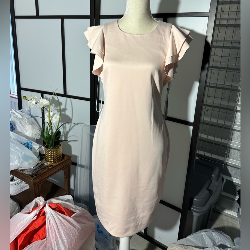 $99NWT Tommy Hilfiger dress Trumpet sleeves knee length dress Light orange color
